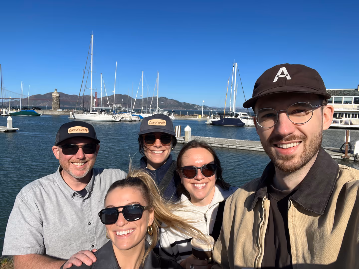 fare·well teammates together at a marina