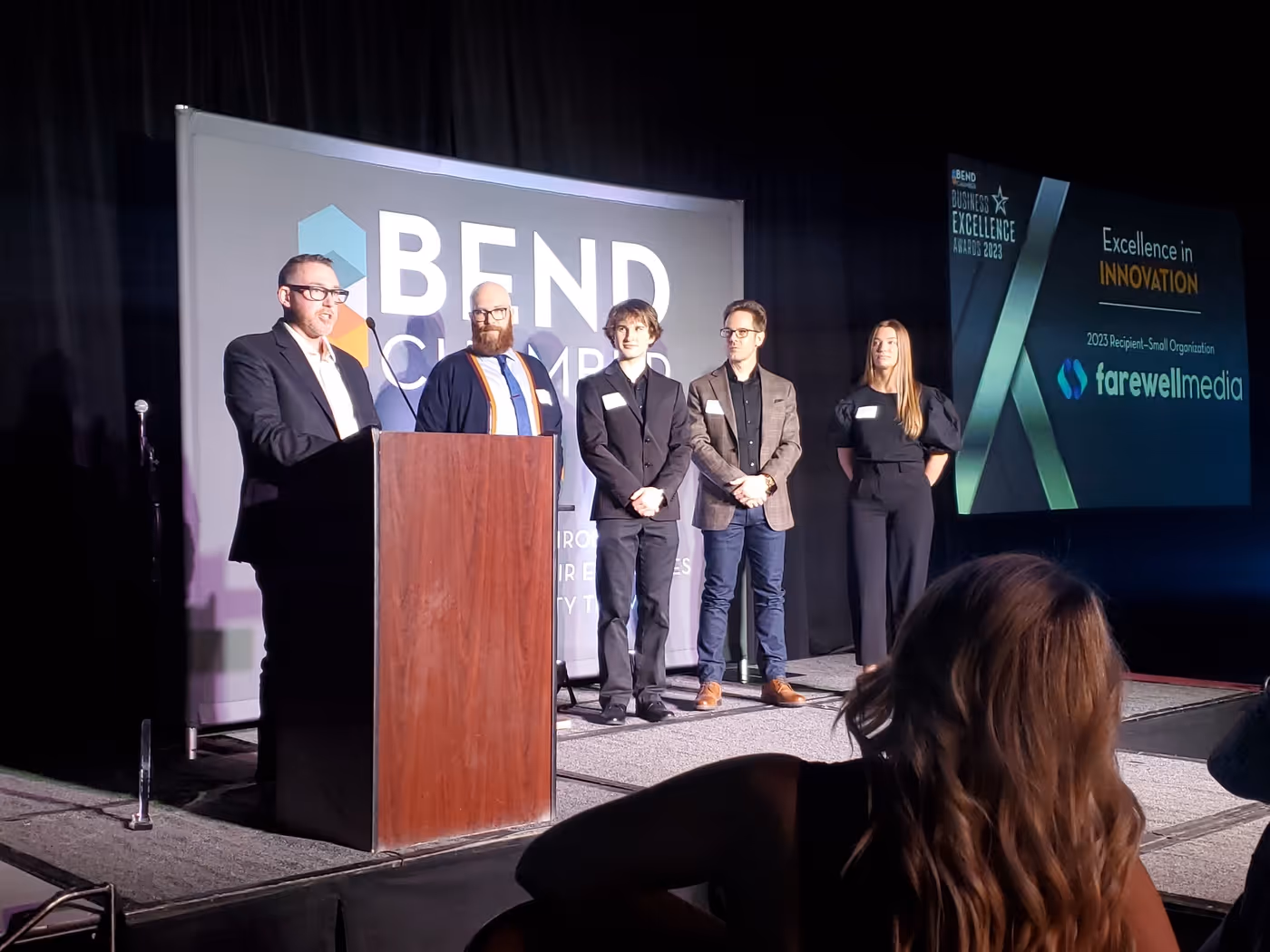 The team on stage at a Bend Chamber of Commerce awards event